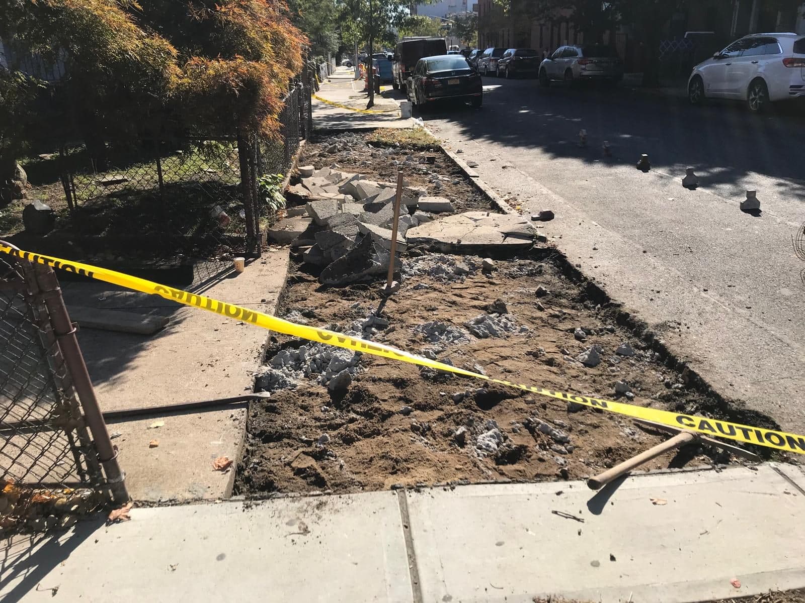 Sidewalk area cleared down to the base