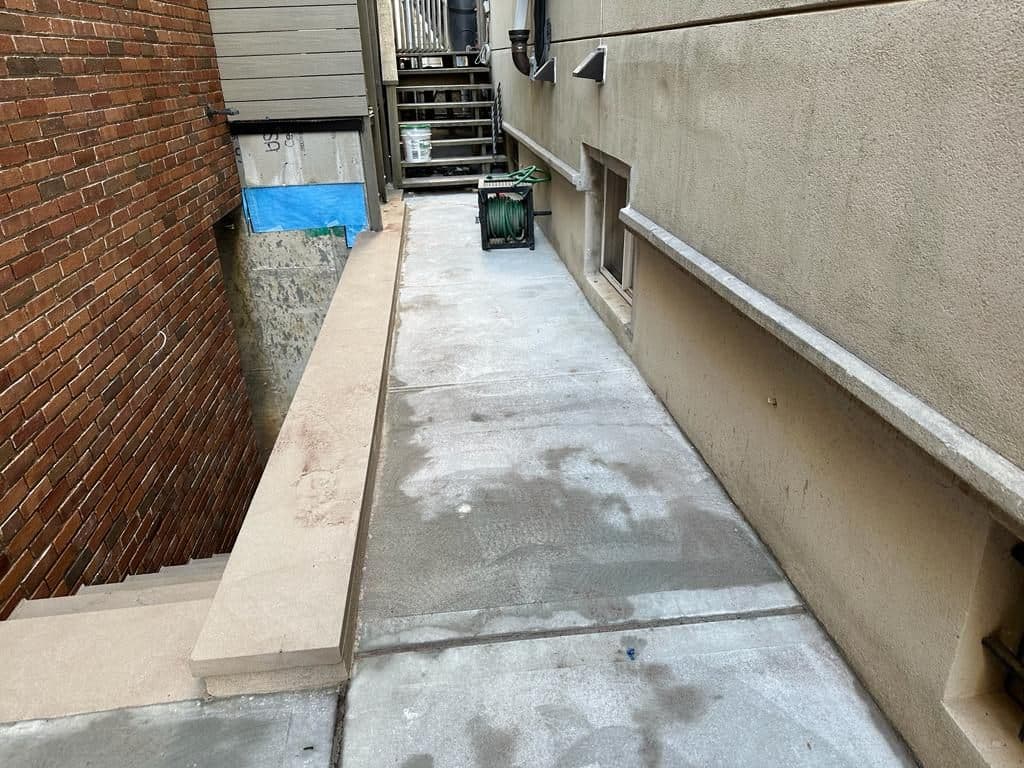 New concrete along the side walkway