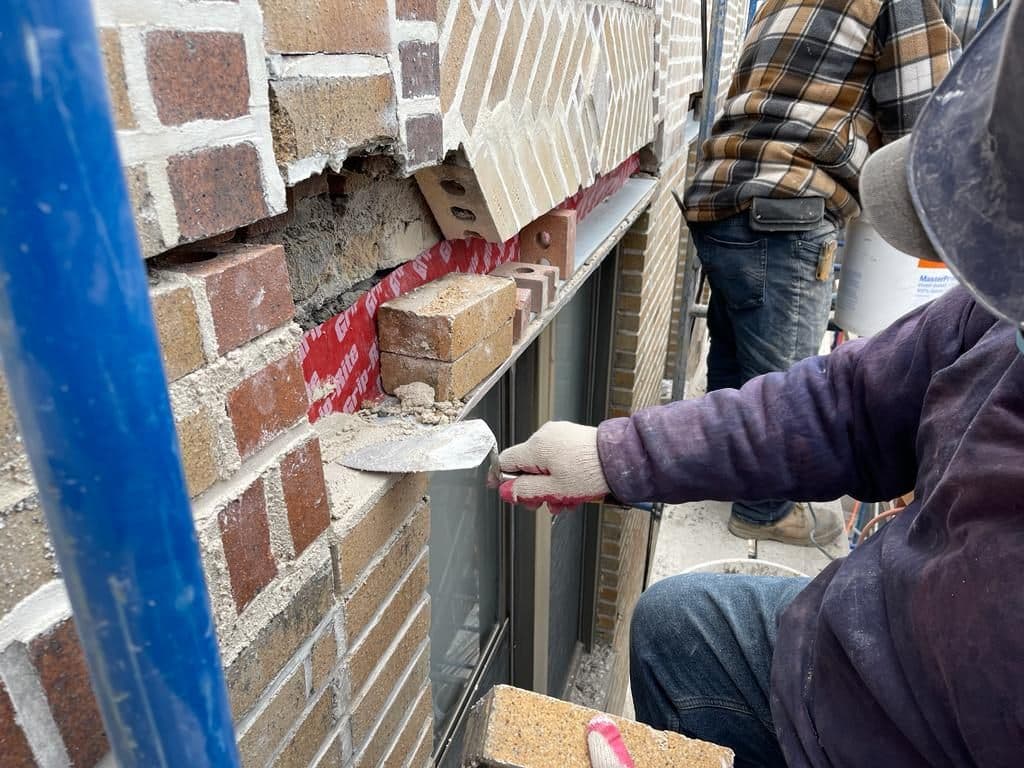 Brick being reset above a new lintel
