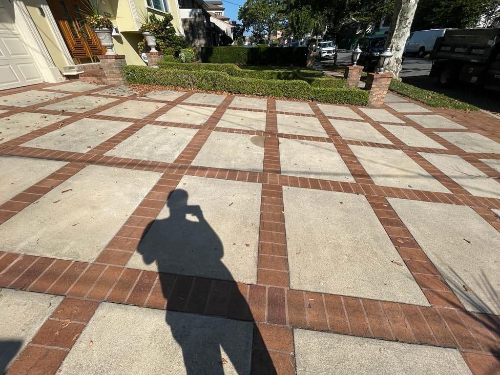 Jerusalem stone squares set with a brick-pattern border