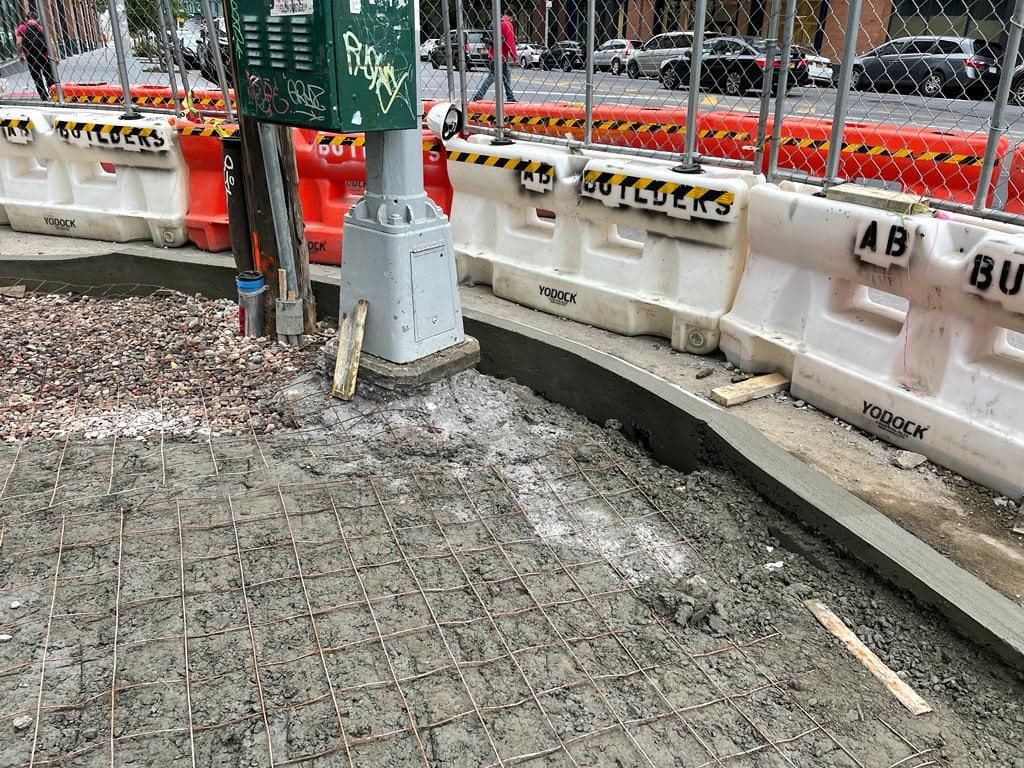 Wire mesh laid over the base before the pour