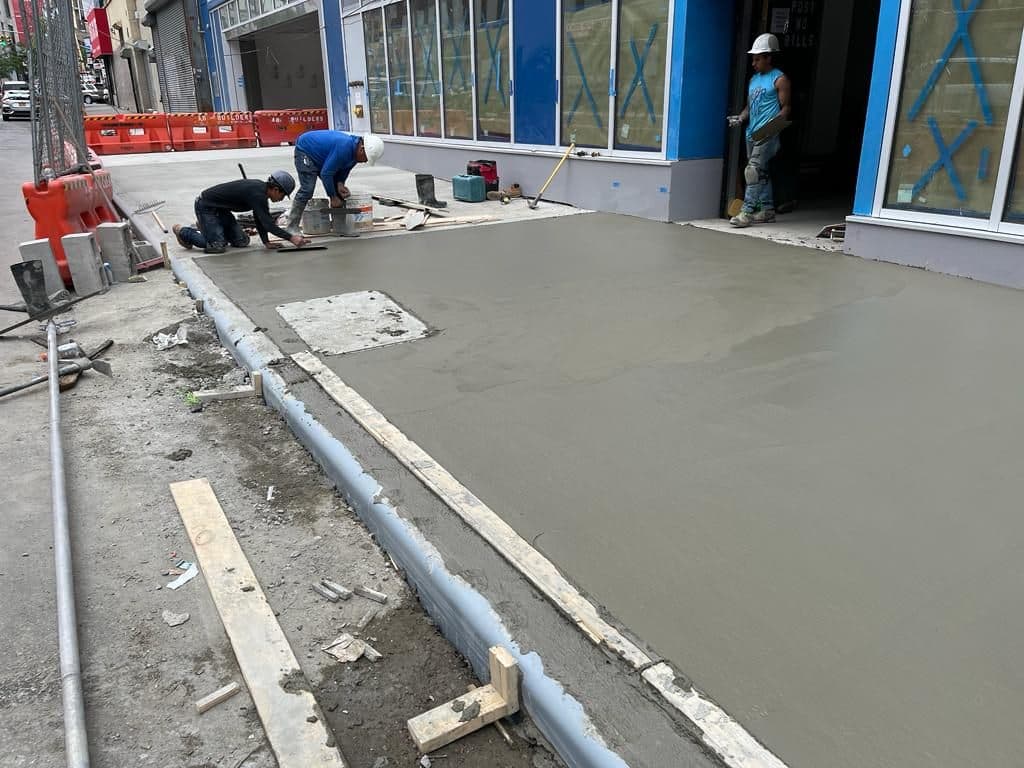 Fresh concrete finished between the forms
