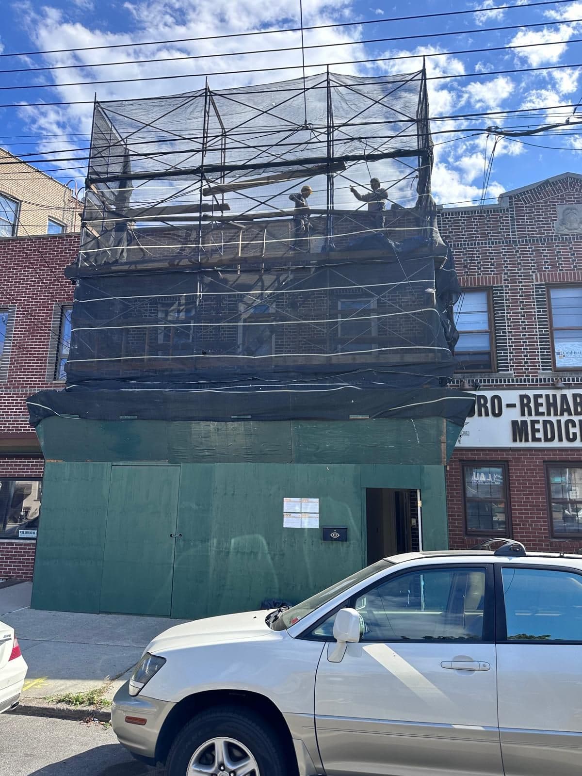 Scaffolding and sidewalk shed on a Brooklyn building