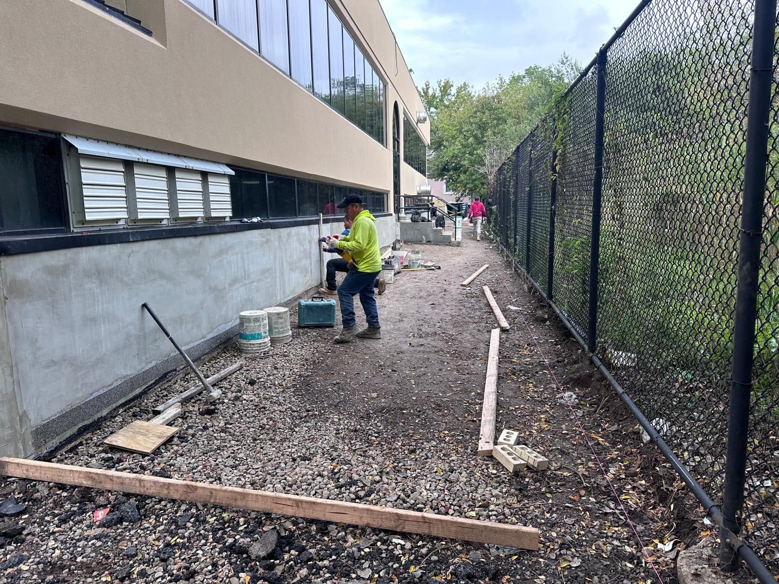 Forms set along the building for the new walkway