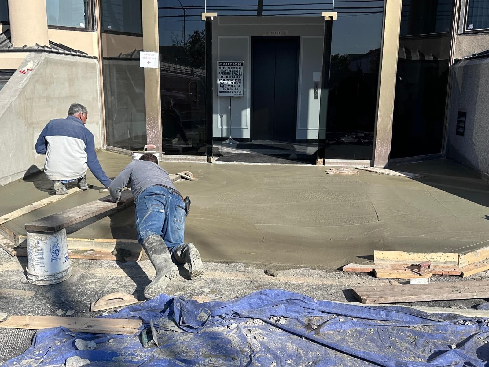 Crew finishing the entrance slab