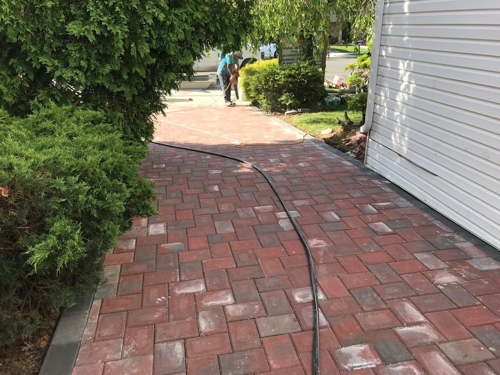 New paver walkway along the side of the house