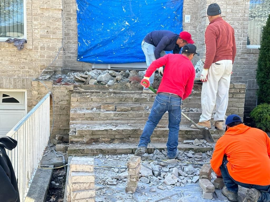 Crew breaking out the old front steps
