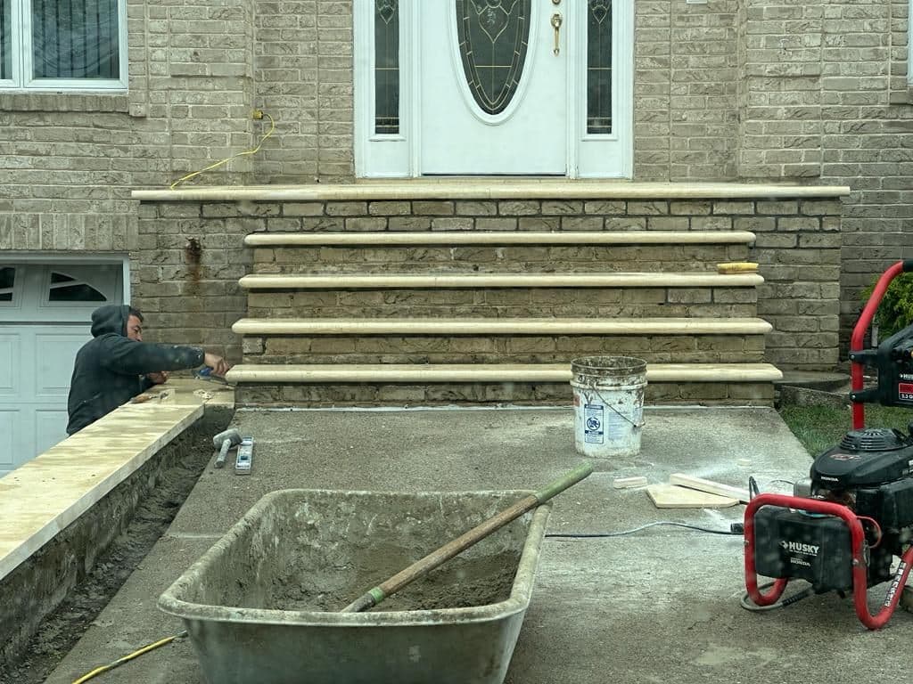 New stone steps set at the front door