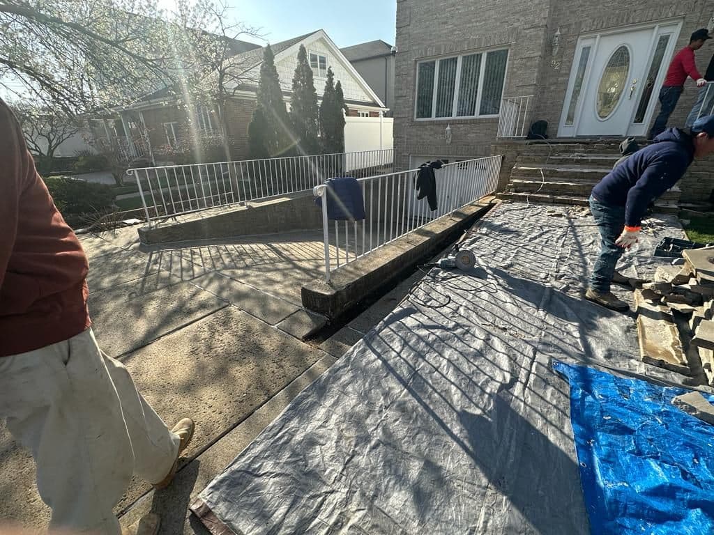 Side walkway being laid with protection down