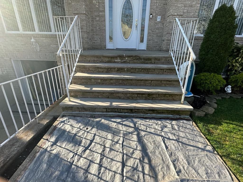 Before: old slate front steps and railings