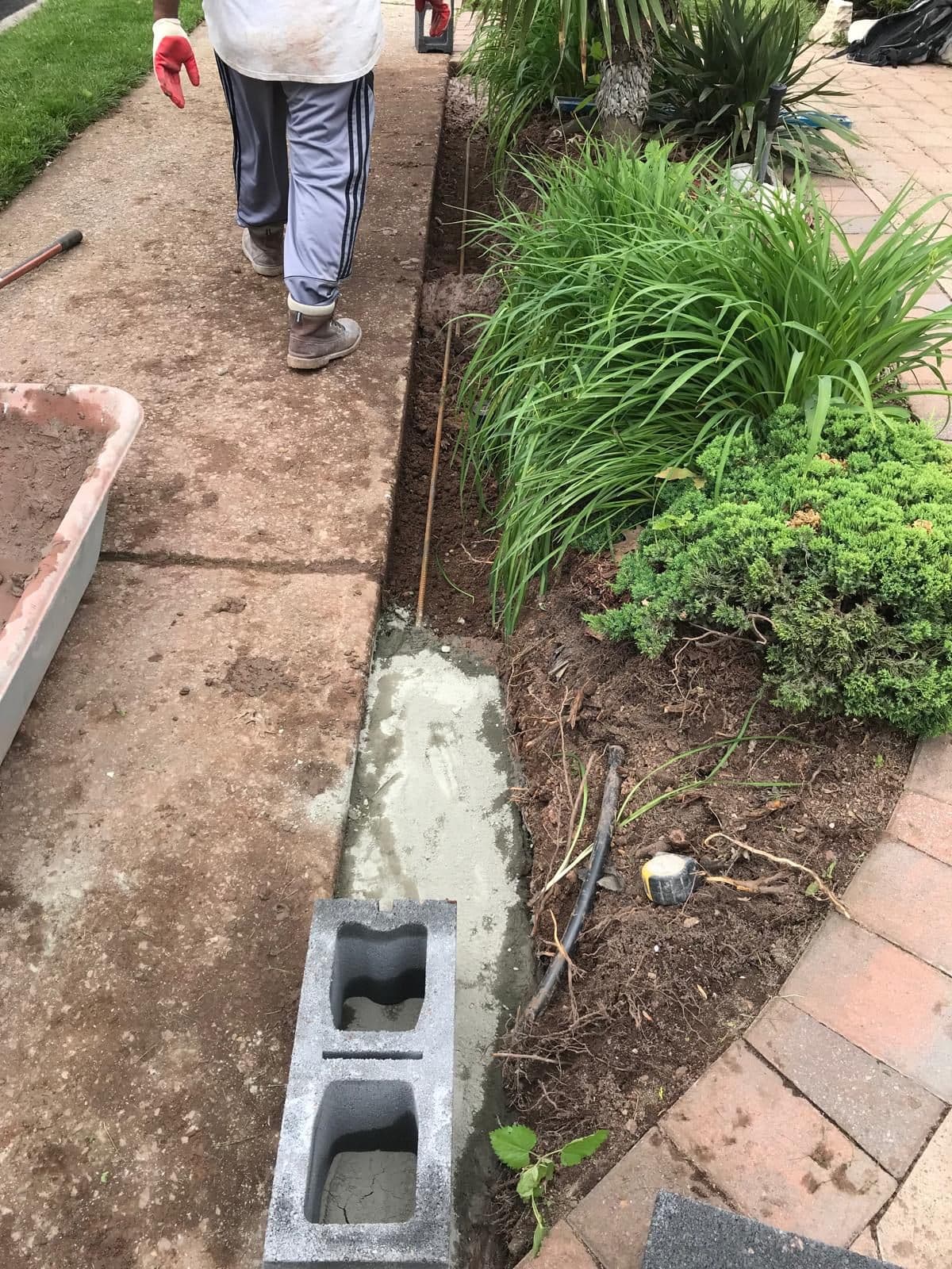 Concrete block base for the new garden wall