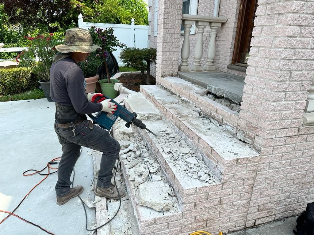 Crew breaking out the old step surfaces