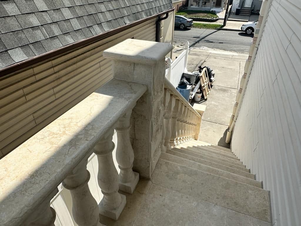 Side staircase finished in matching stone