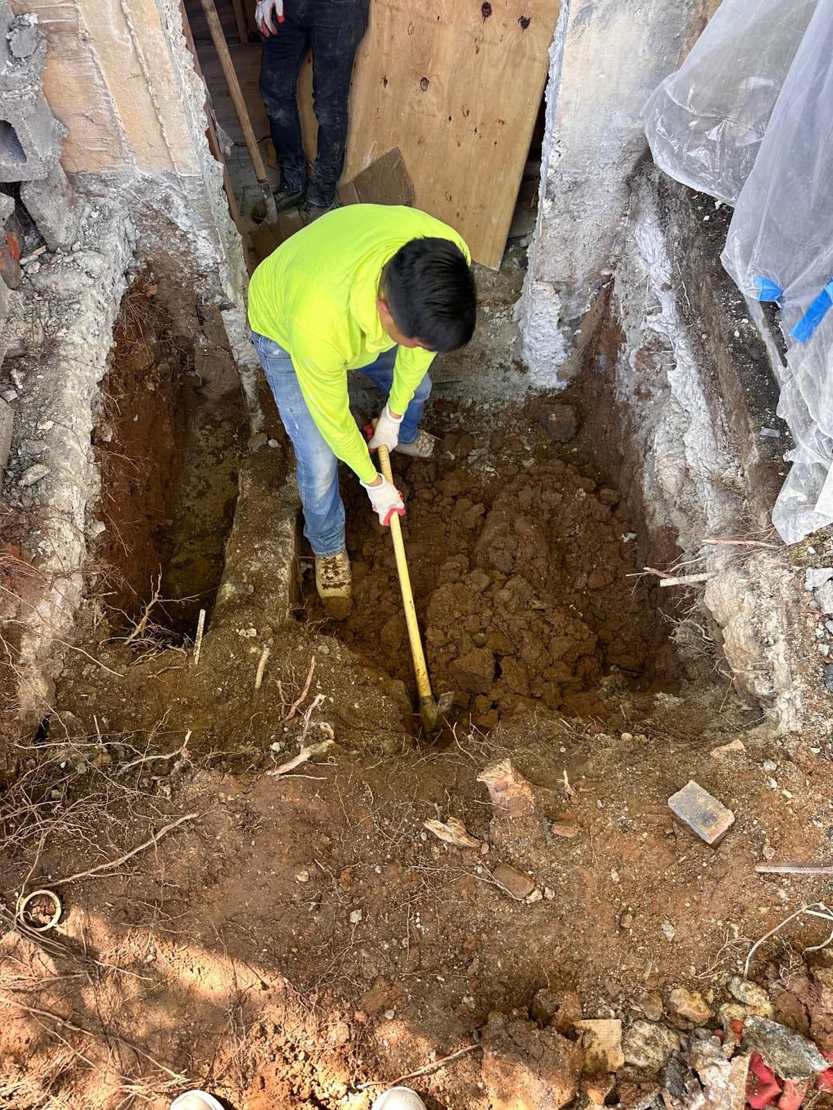 Crew digging out the basement stairwell