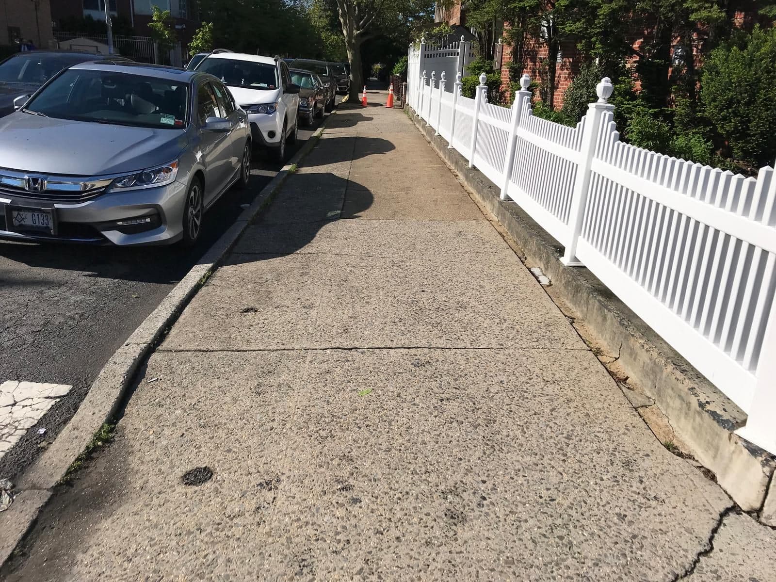 Before: cracked sidewalk in Gravesend, Brooklyn